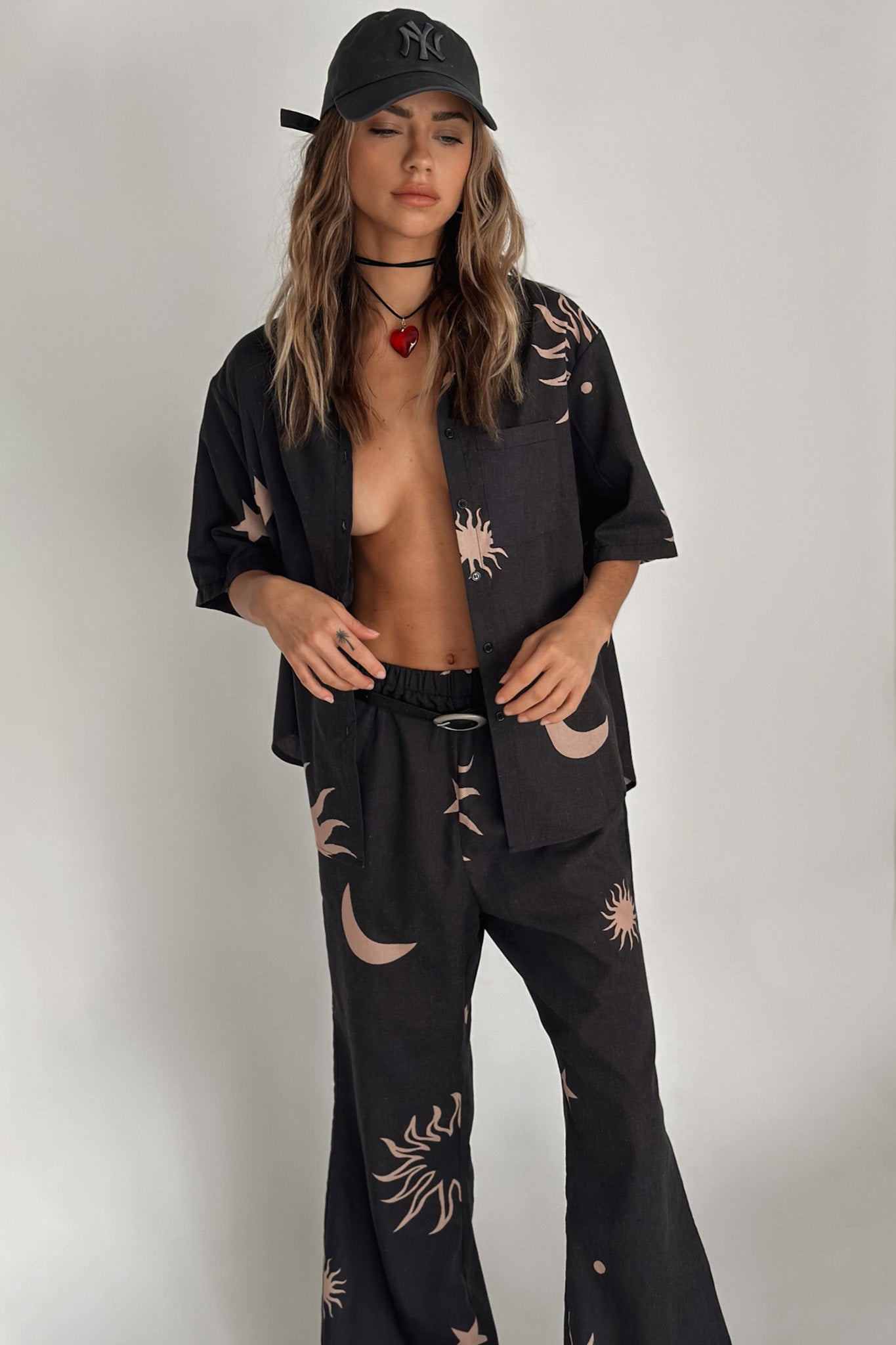 Shop the Just A Hunch Pants Sun Moon Black