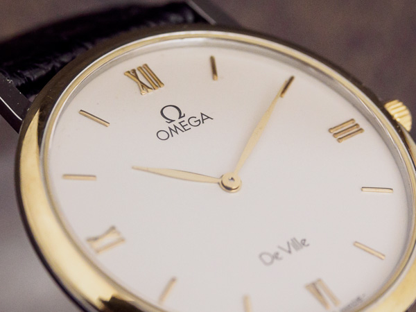 オメガ デビル ラウンド 薄型 クオーツ YG/SS ケース スタイリッシュな