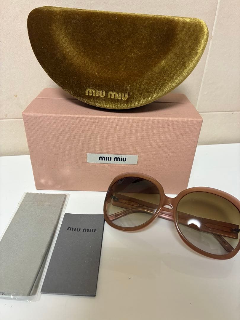 MIU MIU ブラウン　サングラス 楽天市場】ミュウミュウ Miu Miu MIUMIU サングラス 0MU 04ZS オーバル